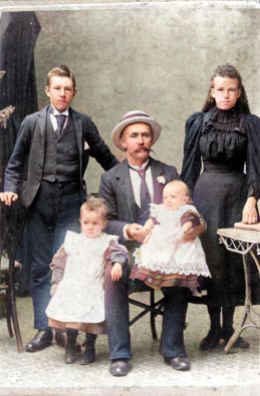 John Young, his two sons Cecil and Jack, and his two step-children Bob and Mary Ann Whiteman. Photo colourised using the MyHeritage photo tool